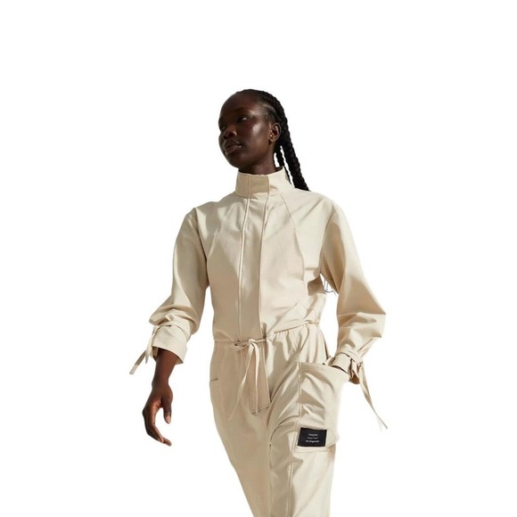 Sweaty Betty x Halle Berry NEW Jackie Jumpsuit Beige Size Medium Re Spin Edit - Picture 3 of 10